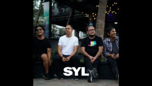 Portada del episodio Vale la Pena con Mayra Nazario: La banda SYL nos presenta su último sencillo titulado «Hombre nue…